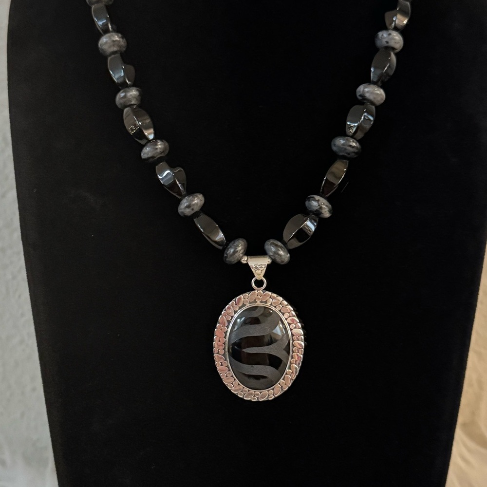 Elegant Black Beaded Necklace with Silver Pendant